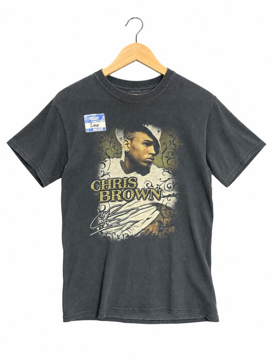 OutOf10 vintage-style black cotton crewneck t-shirt featuring a Chris Brown graphic print and signature on a hanger.