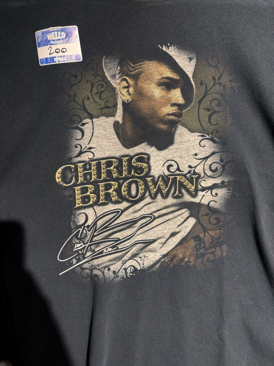 OutOf10 black cotton crewneck t-shirt featuring a vintage Chris Brown graphic print with filigree and signature.