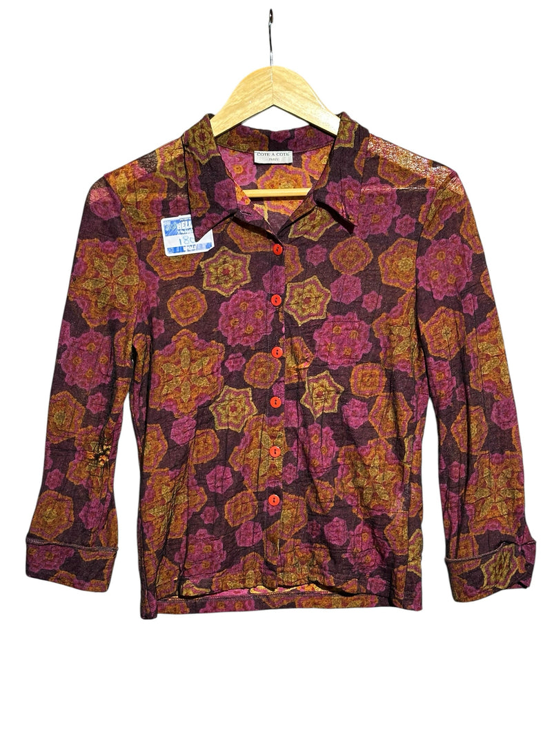 OutOf10 Cote A Cote Paris semi-sheer button-down shirt featuring a geometric floral print in plum, magenta, and ochre.
