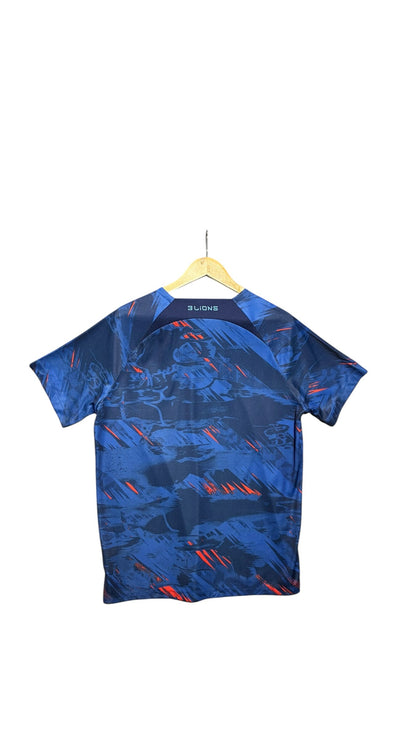 OutOf10 England national team performance jersey in blue with abstract graphic pattern and red accents, back view.