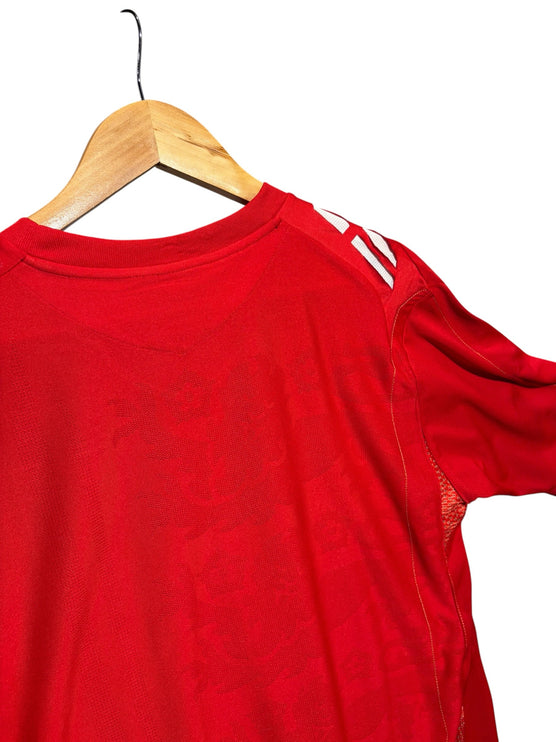 OutOf10 red England national football team jersey with subtle textured pattern and white shoulder stripe detail
