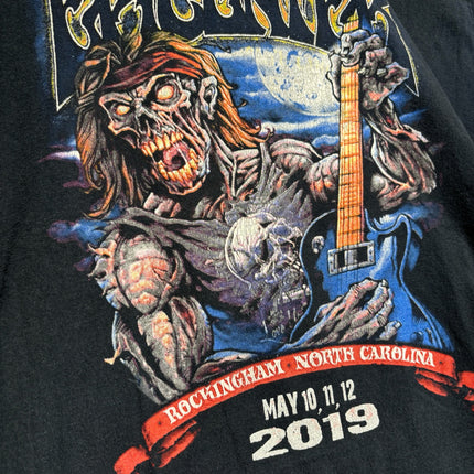 OutOf10 black cotton t-shirt featuring a detailed zombie guitarist graphic from the 2019 Epicenter music festival.