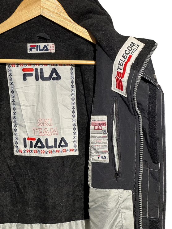Interior of OutOf10 vintage FILA Ski Team Italia jacket showing branding, Thermore insulation label, and zipper.