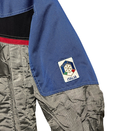 OutOf10 vintage FILA Ski Team Italia jacket sleeve with embroidered logo patch in silver, royal blue, and black