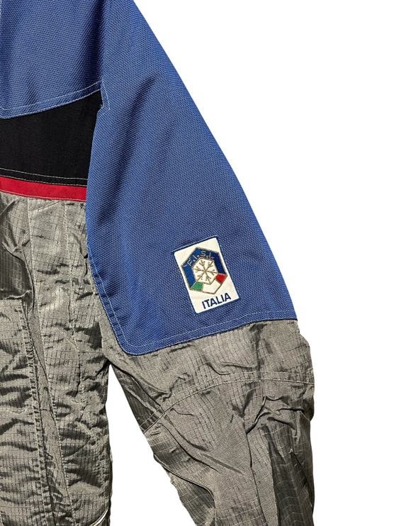 OutOf10 vintage FILA Ski Team Italia jacket sleeve with embroidered logo patch in silver, royal blue, and black
