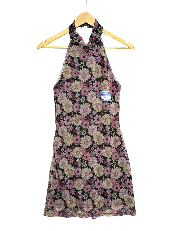 OutOf10 floral print halter neck mini dress in pink, cream, and black on a wooden hanger.