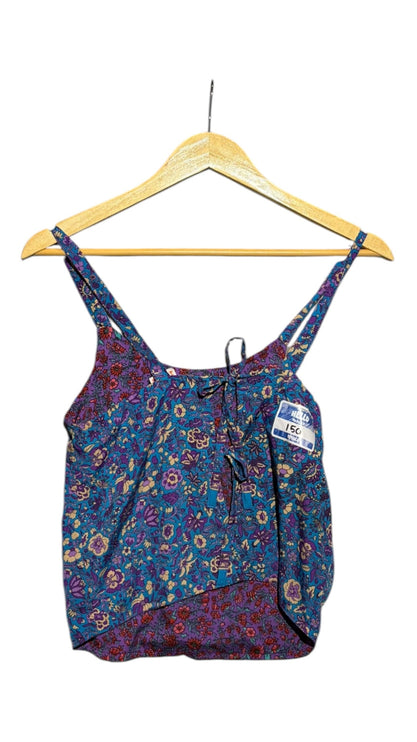 OutOf10 floral print camisole top with spaghetti straps, front tie detail, and vibrant blue and purple garden pattern.