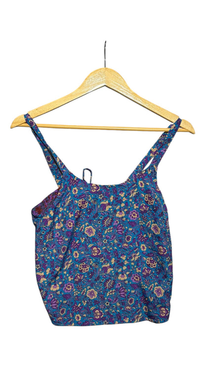 OutOf10 floral print camisole top with spaghetti straps in blue and purple on a wooden hanger