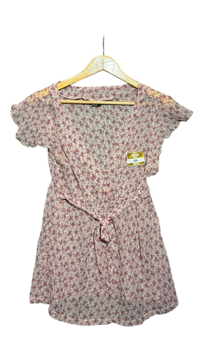 OutOf10 purple and white floral print short sleeve wrap blouse with a tie-waist detail on a wooden hanger