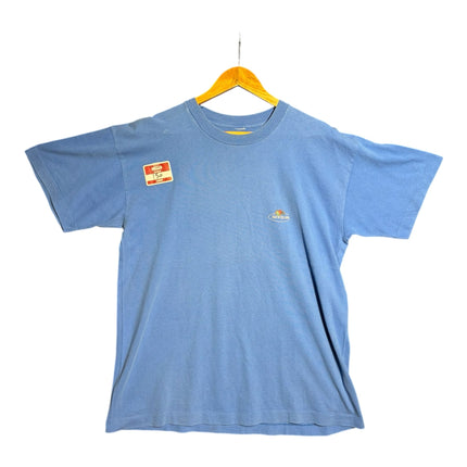 OutOf10 vintage Fruit of the Loom dusty blue cotton crewneck t-shirt with small chest logo on a wooden hanger