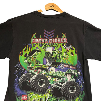 OutOf10 black cotton t-shirt featuring a vibrant Grave Digger monster truck graphic with green flames and lightning.