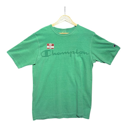 OutOf10 green Champion crew neck t-shirt with a vintage garment-dyed finish and tonal chest logo on a hanger