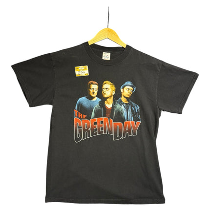 OutOf10 black cotton crew-neck t-shirt featuring a vintage Green Day band member graphic print on the front.