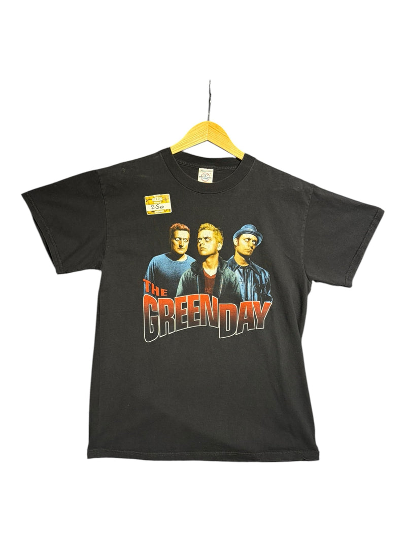OutOf10 black cotton crew-neck t-shirt featuring a vintage Green Day band member graphic print on the front.
