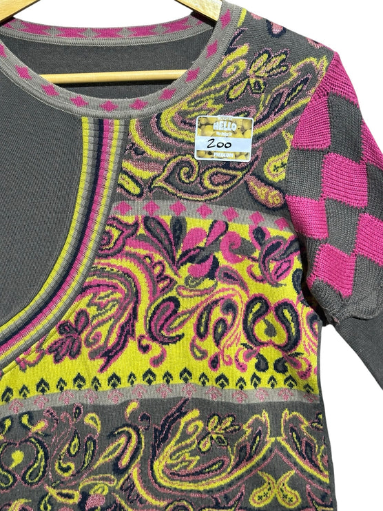 OutOf10 grey knit sweater with vibrant yellow and pink paisley patterns and a pink-grey diamond sleeve detail.