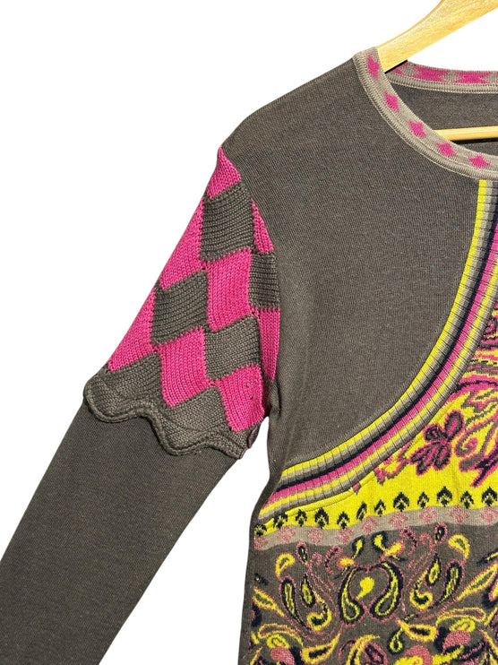 OutOf10 grey knit sweater with yellow and pink paisley patterns and scalloped diamond sleeve detail on a hanger