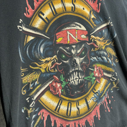 OutOf10 vintage-style washed black cotton t-shirt featuring a bold Guns N' Roses skull and rose graphic print.