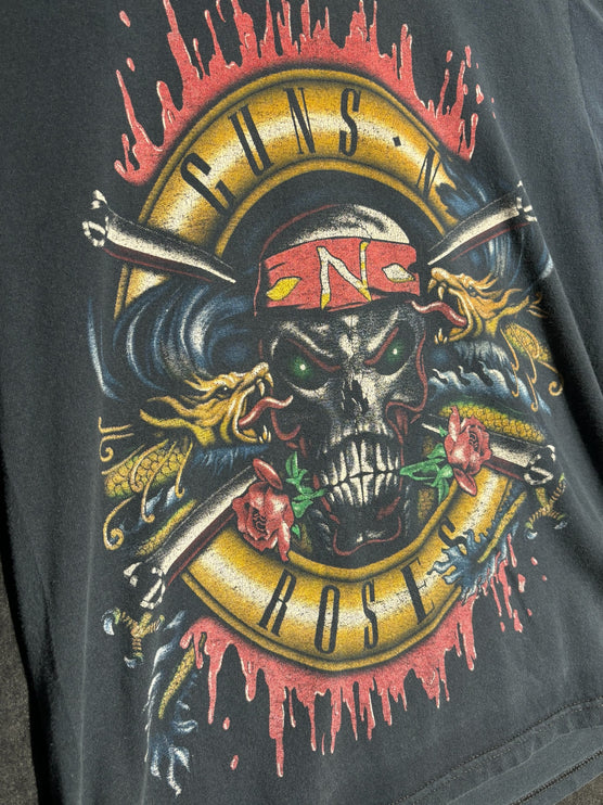 OutOf10 vintage-style washed black cotton t-shirt featuring a bold Guns N' Roses skull and rose graphic print.