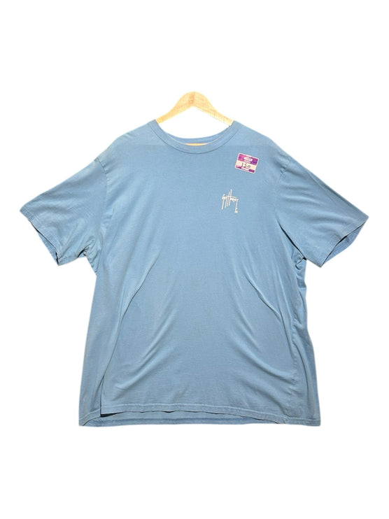 OutOf10 light blue Guy Harvey cotton t-shirt with a small chest logo, displayed on a wooden hanger.