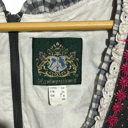 OutOf10 Hammerschmid dirndl dress label showing size 34 with charcoal grey polka dot fabric and pink lace trim