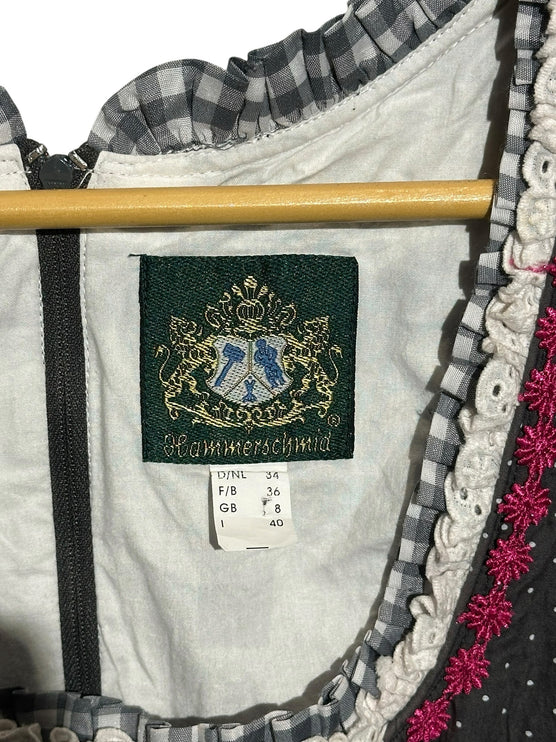 OutOf10 Hammerschmid dirndl dress label showing size 34 with charcoal grey polka dot fabric and pink lace trim