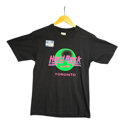 OutOf10 black cotton Hard Rock Cafe Toronto t-shirt with neon green and pink graphic print on a wooden hanger