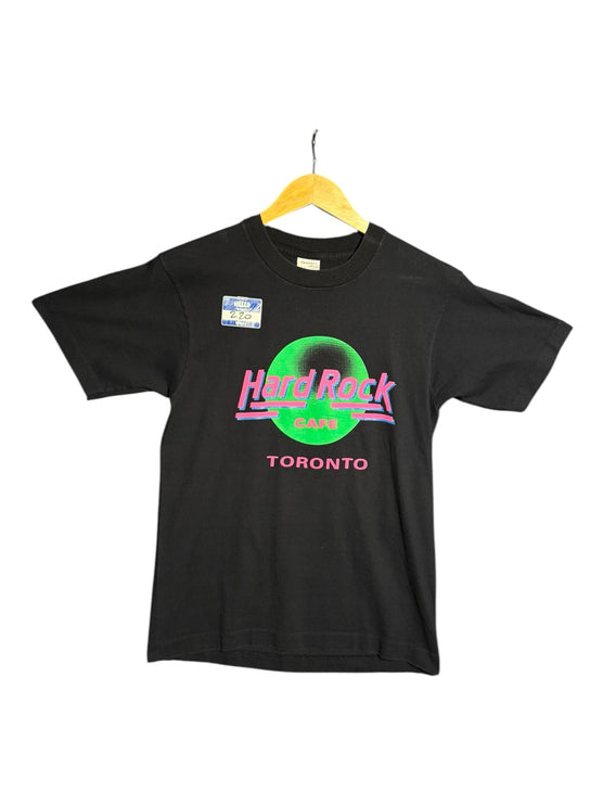 OutOf10 black cotton Hard Rock Cafe Toronto t-shirt with neon green and pink graphic print on a wooden hanger
