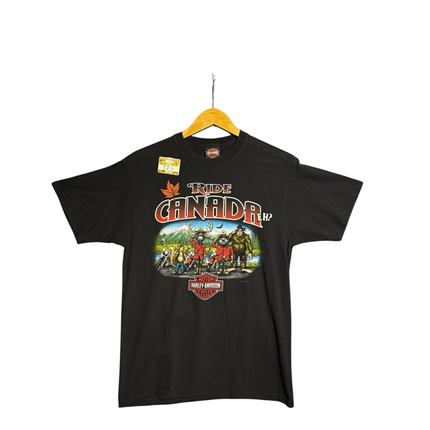 OutOf10 black Harley-Davidson Canada graphic t-shirt featuring a moose and sasquatch illustration on the front.