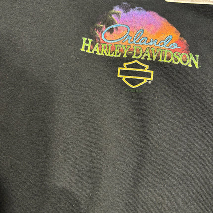OutOf10 black cotton t-shirt featuring a vibrant Harley-Davidson Orlando graphic with a tropical sunset design.