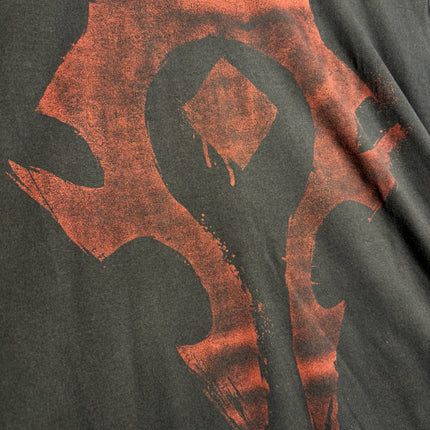 OutOf10 black cotton crewneck t-shirt featuring a distressed red World of Warcraft Horde faction symbol graphic.