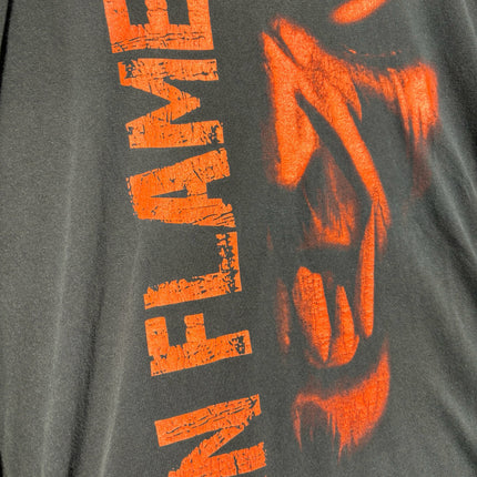 OutOf10 black cotton t-shirt featuring a distressed orange In Flames band logo graphic print.