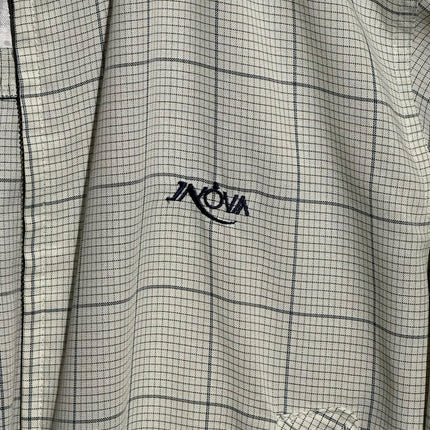 OutOf10 INOVA casual bomber jacket featuring a neutral grid-check pattern and embroidered chest logo
