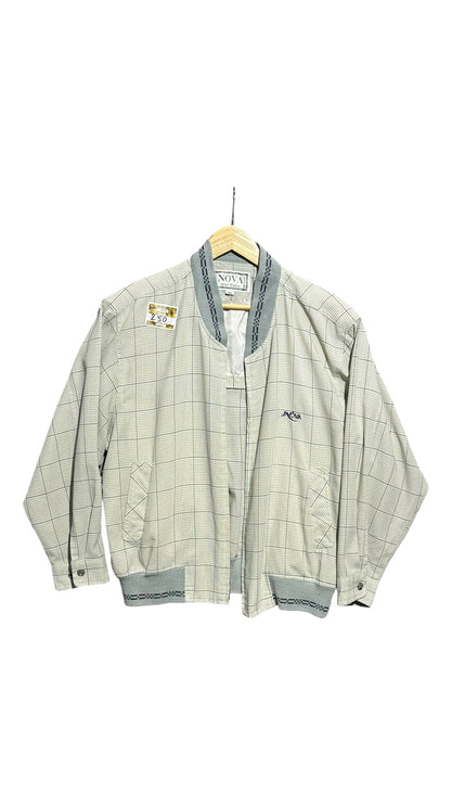 OutOf10 INOVA casual bomber jacket featuring a neutral grid-check pattern, ribbed collar, and embroidered chest logo.