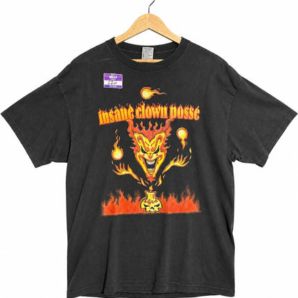 OutOf10 black cotton t-shirt featuring a flaming jester and skull graphic print on the front