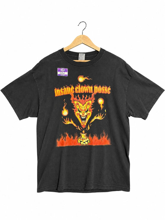 OutOf10 black cotton t-shirt featuring a flaming jester and skull graphic print on the front