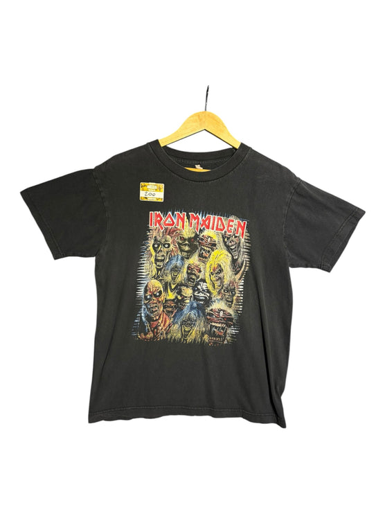 OutOf10 black cotton Iron Maiden t-shirt featuring a vintage Eddie mascot graphic print on a wooden hanger