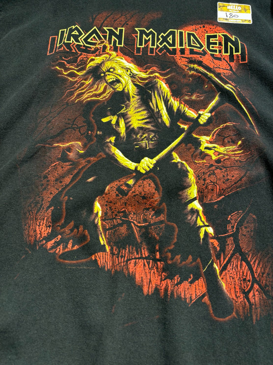 OutOf10 black cotton t-shirt featuring a vibrant yellow and red Iron Maiden Eddie graphic print on the front