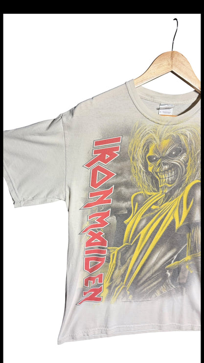 OutOf10 light grey Iron Maiden graphic t-shirt featuring Eddie mascot print and red logo on a wooden hanger