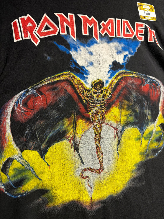 OutOf10 vintage black Iron Maiden graphic t-shirt featuring a winged skeletal figure in yellow and blue