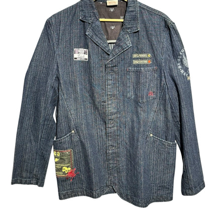 OutOf10 JNCO JEANS dark wash herringbone denim workwear blazer with military patches and button-front closure.