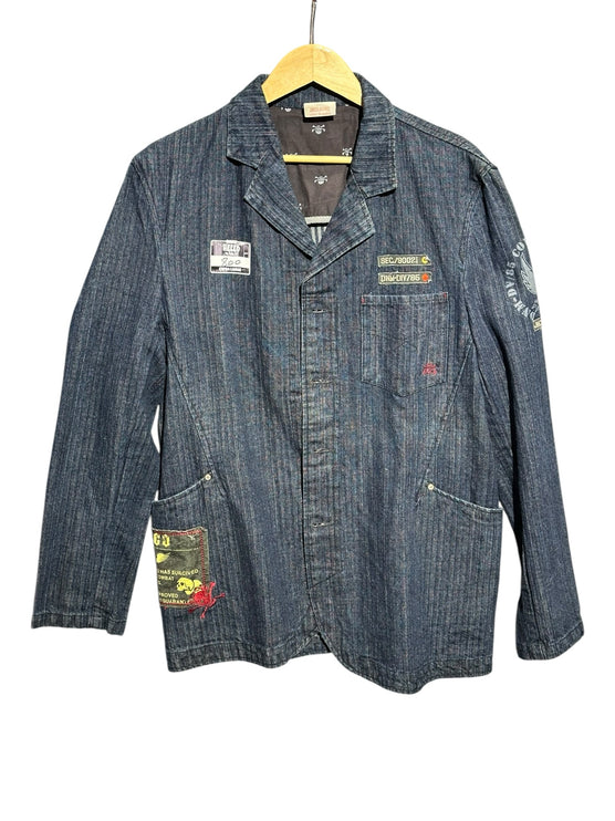 OutOf10 JNCO JEANS dark wash herringbone denim workwear blazer with military patches and button-front closure.