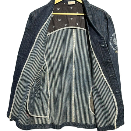 OutOf10 JNCO JEANS dark wash denim workwear blazer with striped lining, skull pattern details, and embroidered patch.