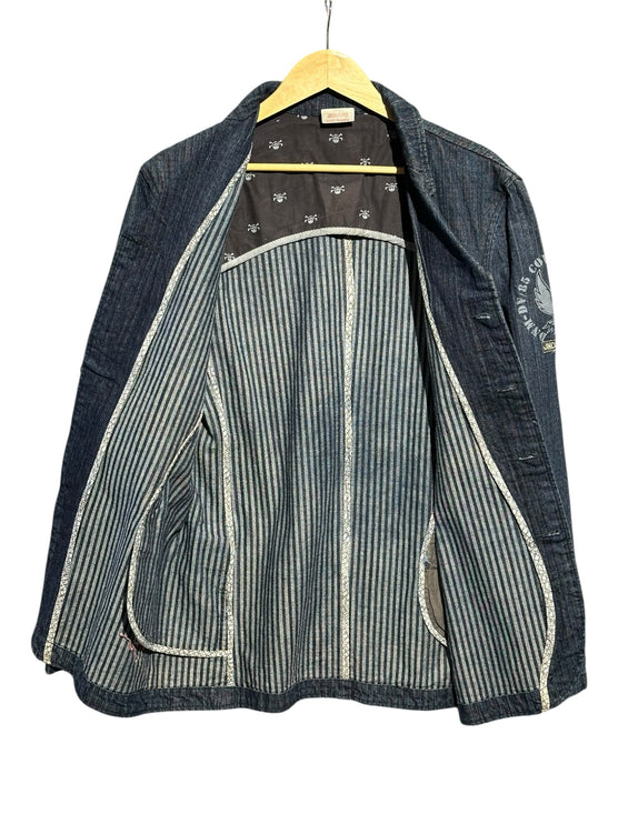 OutOf10 JNCO JEANS dark wash denim workwear blazer with striped lining, skull pattern details, and embroidered patch.