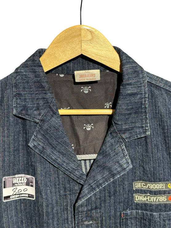 OutOf10 JNCO JEANS dark wash denim workwear jacket with skull print lining, notched lapels, and military patches.