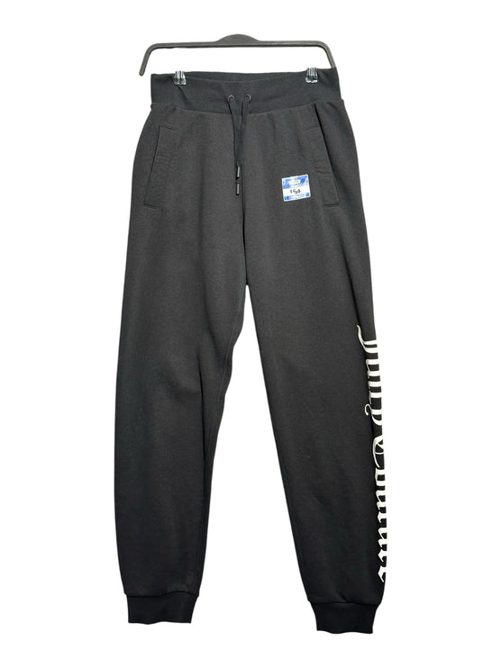 OutOf10 black Juicy Couture Sport fleece joggers with drawstring waist, side pockets, and logo print on the leg.