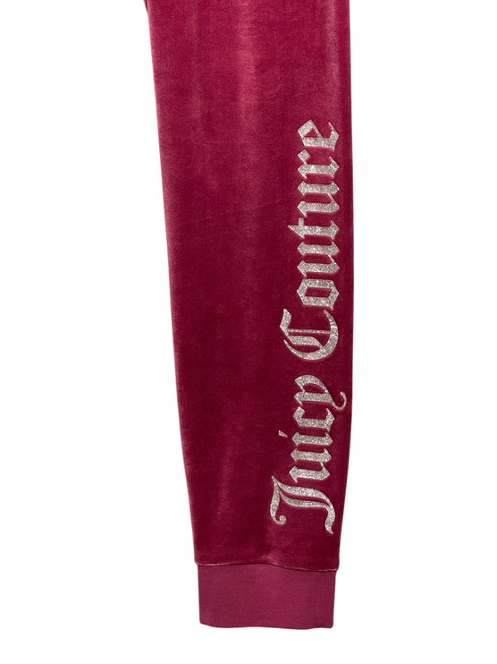 OutOf10 Juicy Couture burgundy velour joggers featuring a shimmering glitter logo down the leg and ribbed ankle cuffs.