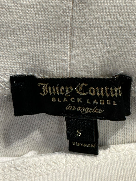 OutOf10 Juicy Couture Black Label joggers featuring a black fabric brand tag on soft off-white terry cloth material