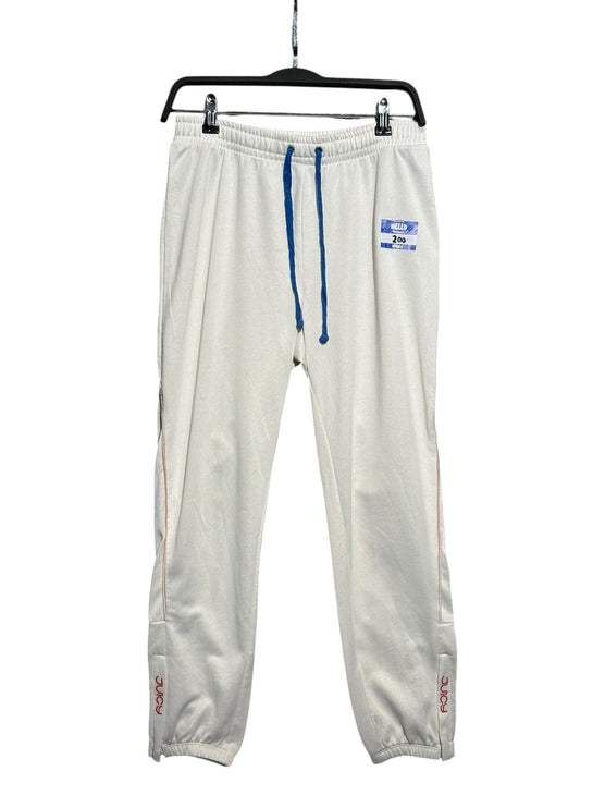 OutOf10 Juicy Couture Black Label off-white jogger pants with blue drawstring and Hello name tag detail on the hip.