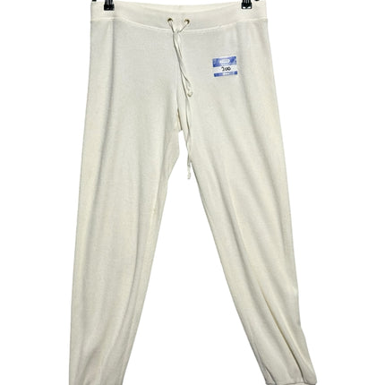 OutOf10 Juicy Couture Black Label off-white terry cloth lounge joggers with drawstring waist and ribbed cuffs.