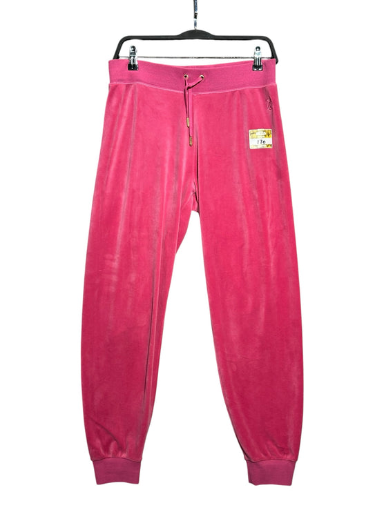 OutOf10 Juicy Couture SPORT vibrant pink velour joggers with an elastic drawstring waistband and ribbed ankle cuffs.